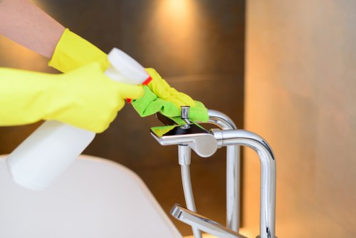 Technician dusting surfaces after construction