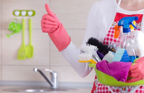 Happy cleaning team ensuring customer satisfaction