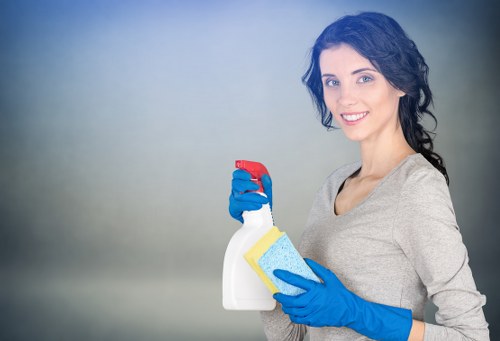 Protective gloves, goggles and PPE laid out before a cleaning job